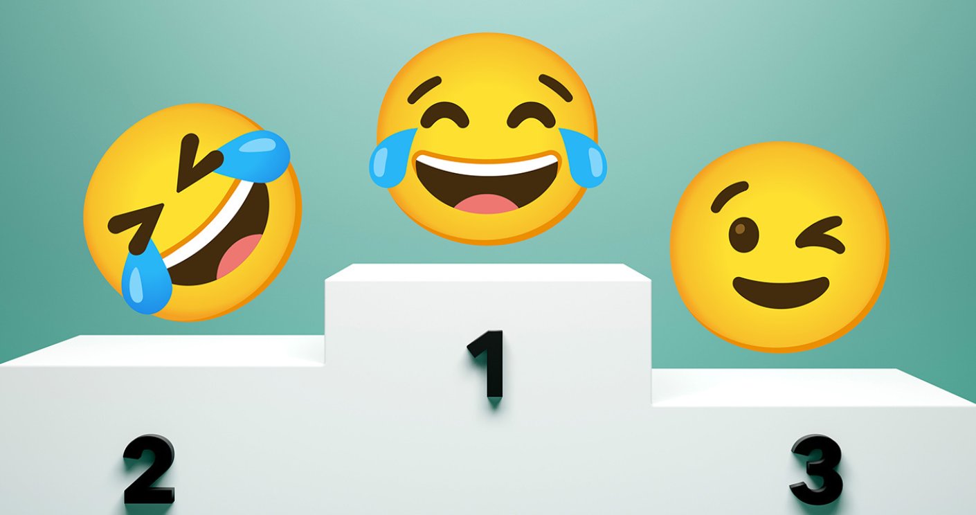 Auf den ersten drei Plätzen der beliebtesten Emojis: das Gesicht mit Freudentränen, das sich vor Lachen auf dem Boden wälzende Gesicht und das zwinkernde Gesicht. © Svetlana Radayeva