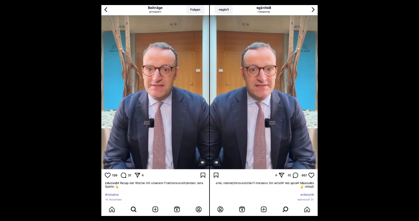 Jens Spahn sitzt in einem Konferenzraum, gespiegelt, mit Brille und Anzug, und lächelt in die Kamera.